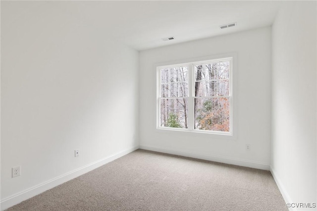 view of carpeted spare room