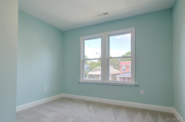 view of carpeted spare room