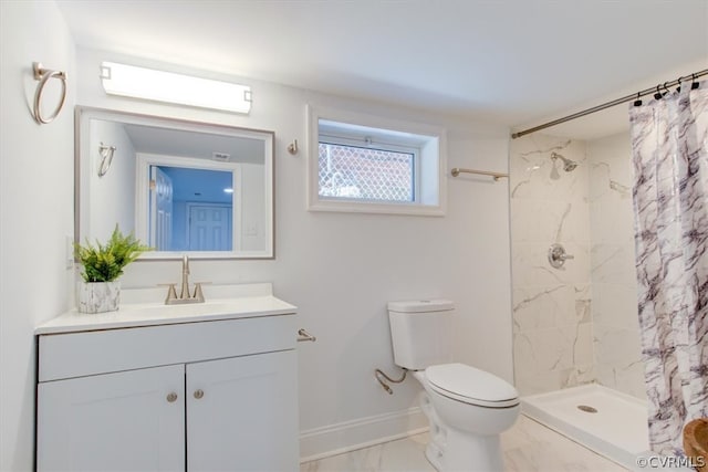 bathroom with vanity, a shower with curtain, and toilet