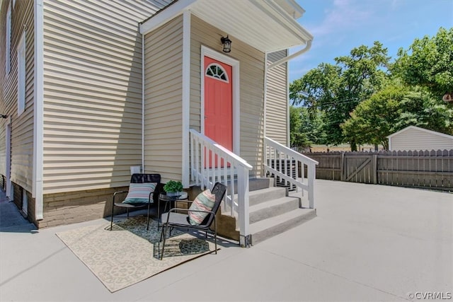 doorway to property featuring a patio area