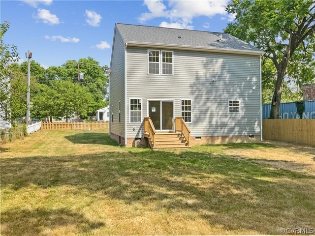 1608 Mechanicsville Tpke, Richmond, VA 23223 - back of property featuring a lawn