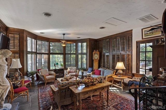 living area featuring a wealth of natural light