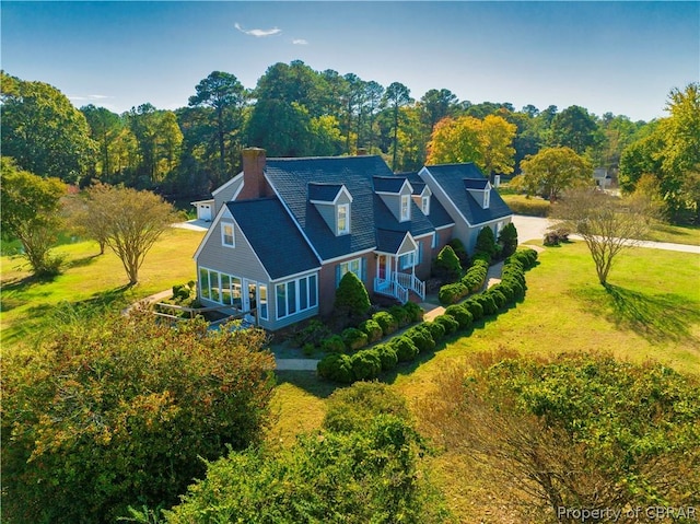 bird's eye view with a view of trees