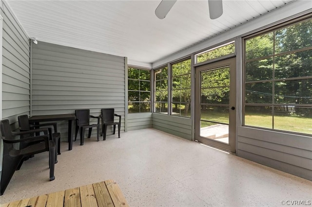 sunroom / solarium with ceiling fan