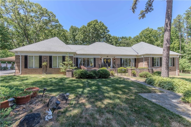 ranch-style house with a front yard