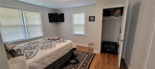 bedroom featuring hardwood / wood-style floors