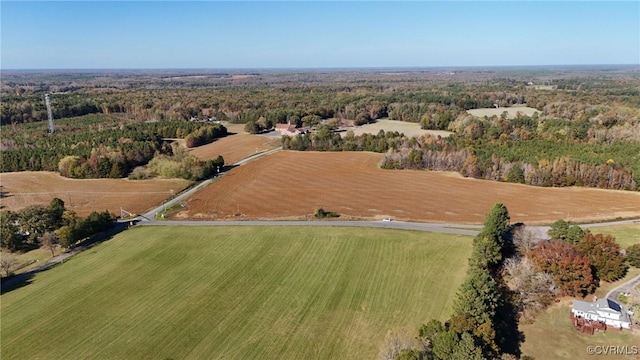 aerial view with a wooded view