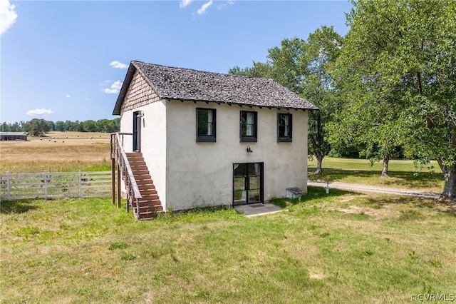 view of outdoor structure with a yard