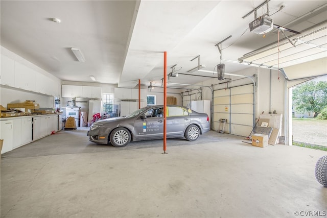 garage featuring a garage door opener