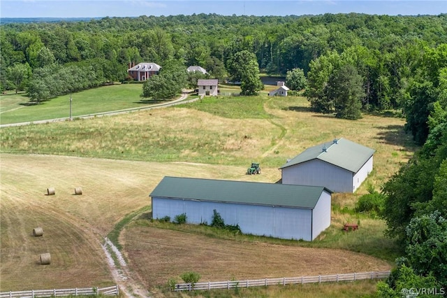 bird's eye view with a rural view and a forest view