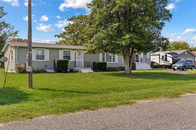 view of front of home featuring a front lawn