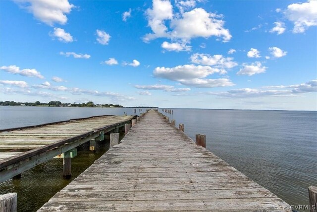 dock area featuring a water view