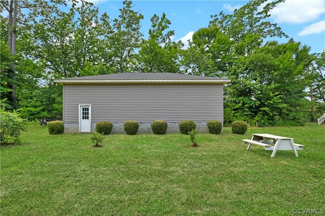 view of home's exterior featuring a yard