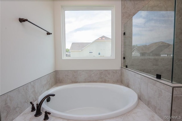 full bathroom featuring a bath