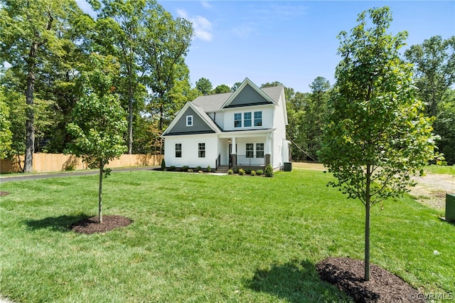 craftsman house featuring a front lawn