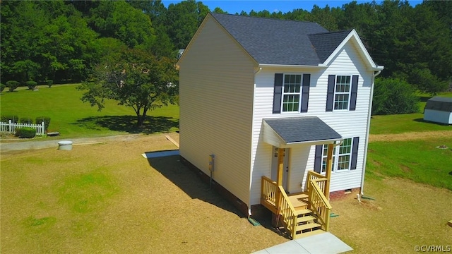 view of front of home featuring a front lawn