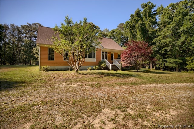 exterior space featuring a front lawn