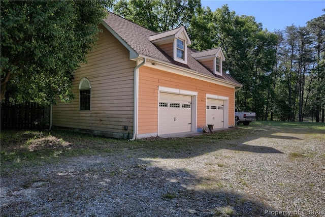 view of home's exterior featuring a garage