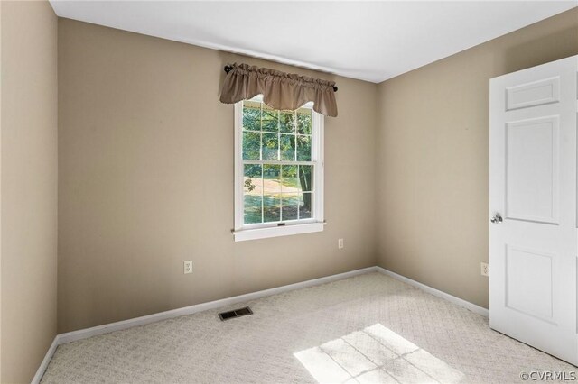 empty room featuring carpet floors