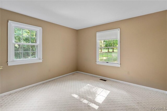 view of carpeted spare room