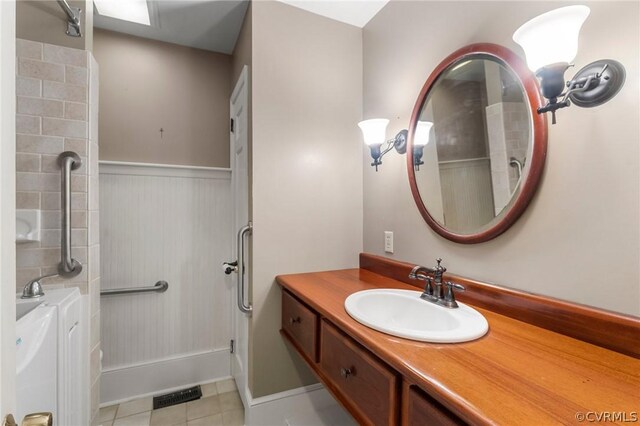 bathroom featuring vanity and tile patterned floors