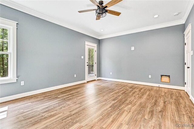 unfurnished room with light wood-type flooring, a healthy amount of sunlight, and ceiling fan