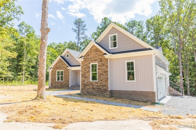 view of front of home with a garage