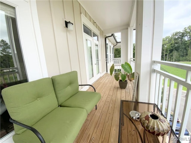 balcony featuring a sunroom