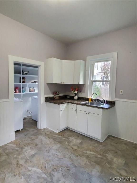 kitchen with sink and white cabinets