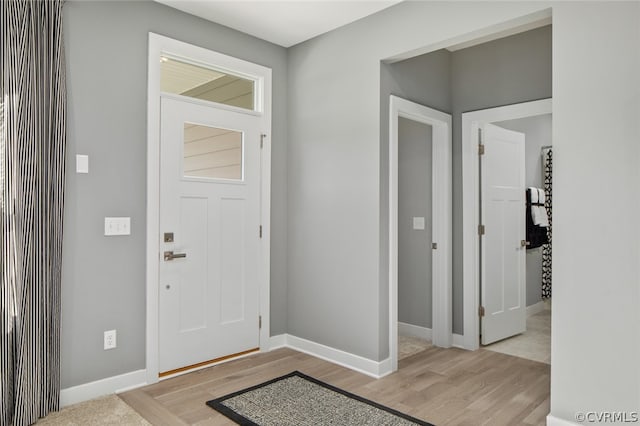 foyer entrance featuring light hardwood / wood-style floors