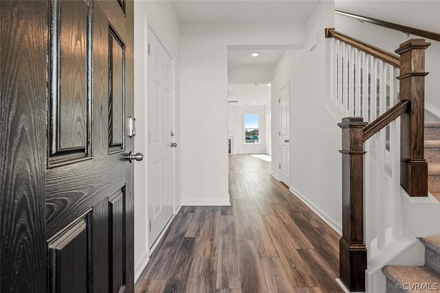 hall featuring dark hardwood / wood-style floors