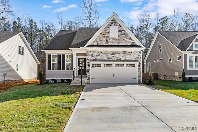 view of front of home featuring a garage and a front lawn