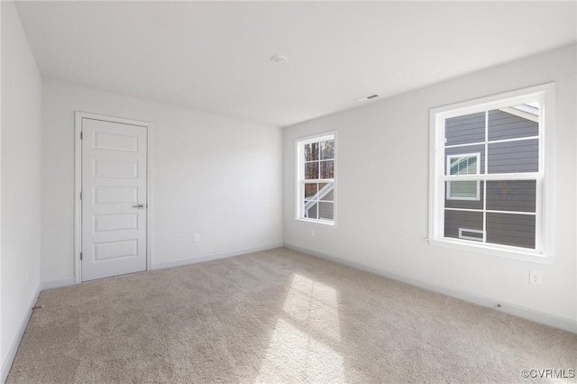 unfurnished room with carpet