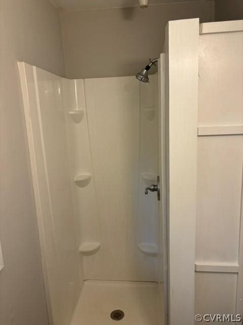 bathroom with a stall shower