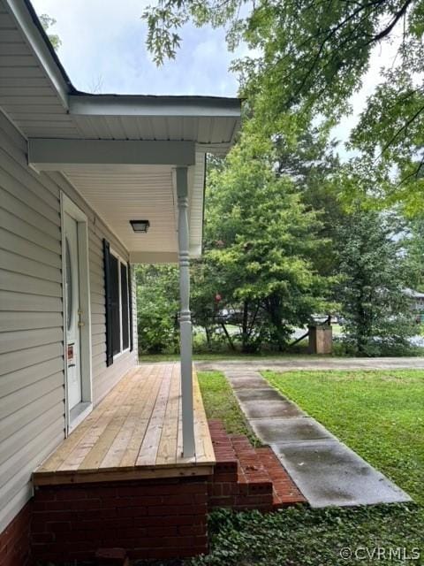 wooden deck featuring a porch