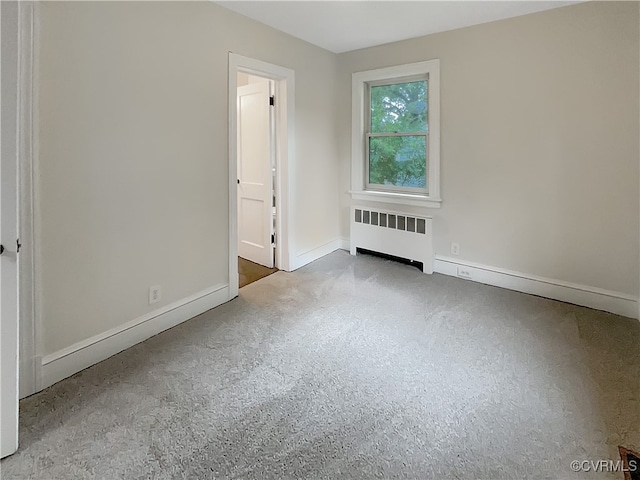 unfurnished bedroom with radiator