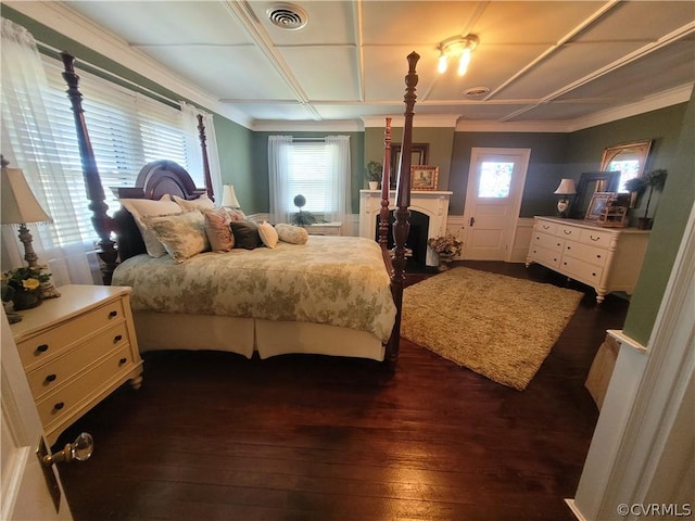 1501 Saxkey Rd, Drakes Branch, VA 23937 - bedroom featuring visible vents, dark wood-style flooring, a fireplace, and multiple windows