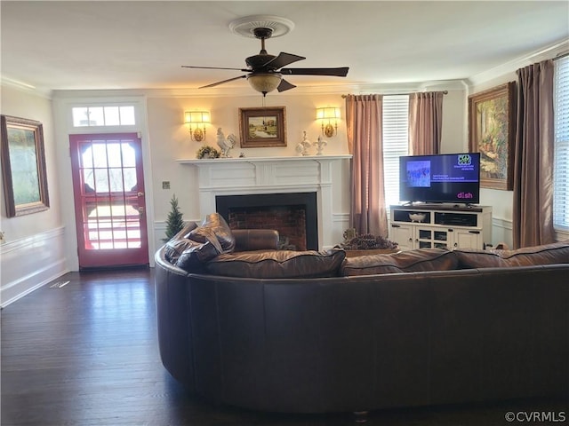 1501 Saxkey Rd, Drakes Branch, VA 23937 - living room featuring ceiling fan, a fireplace, ornamental molding, baseboards, and dark wood-style floors