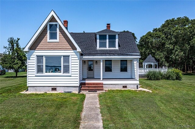 view of front of home featuring a front lawn and covered porch