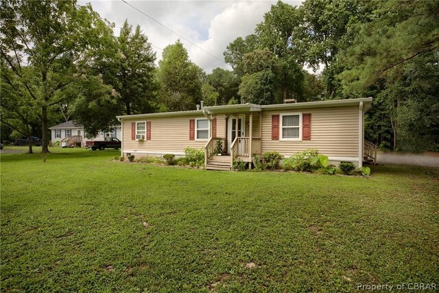 view of front of home with a front lawn