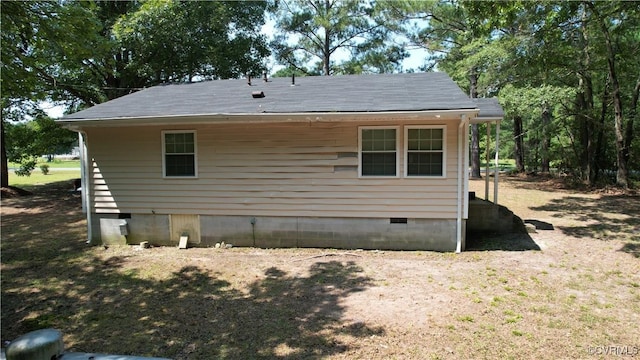 view of side of property featuring crawl space