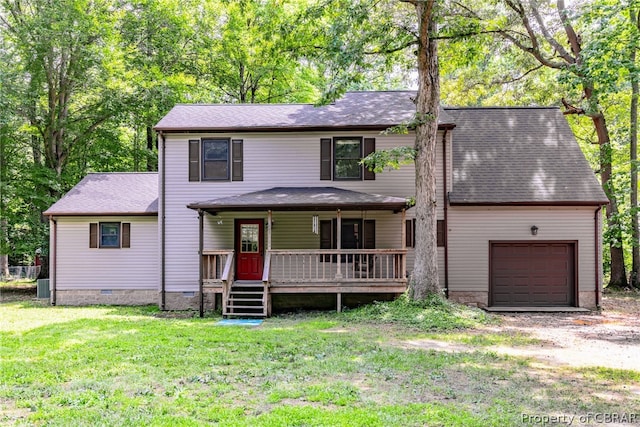 front of property featuring a garage and a front yard