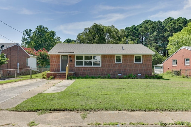 view of front of home with a front yard