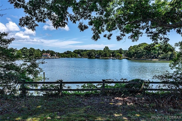 water view featuring fence