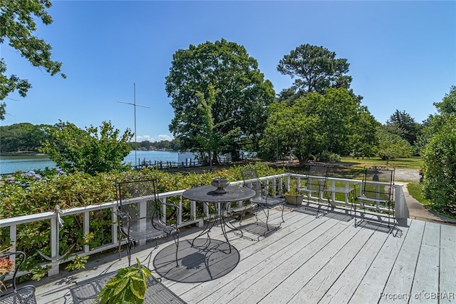 deck featuring a water view