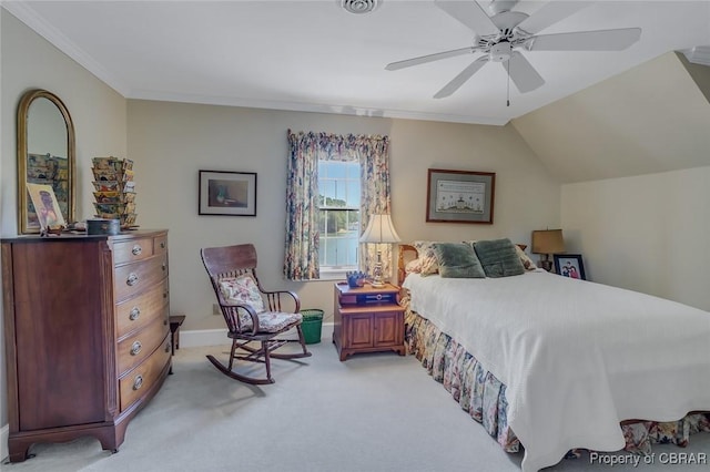 bedroom featuring light carpet, lofted ceiling, ornamental molding, a ceiling fan, and baseboards