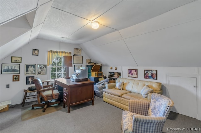 carpeted office space with lofted ceiling