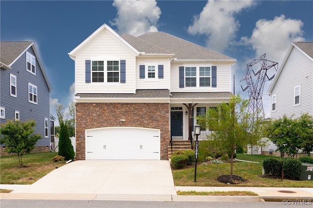 view of front facade with a garage and a front lawn