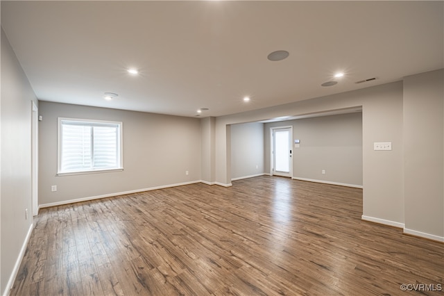 unfurnished room featuring hardwood / wood-style floors