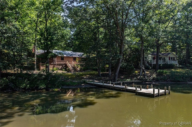 dock area featuring a water view